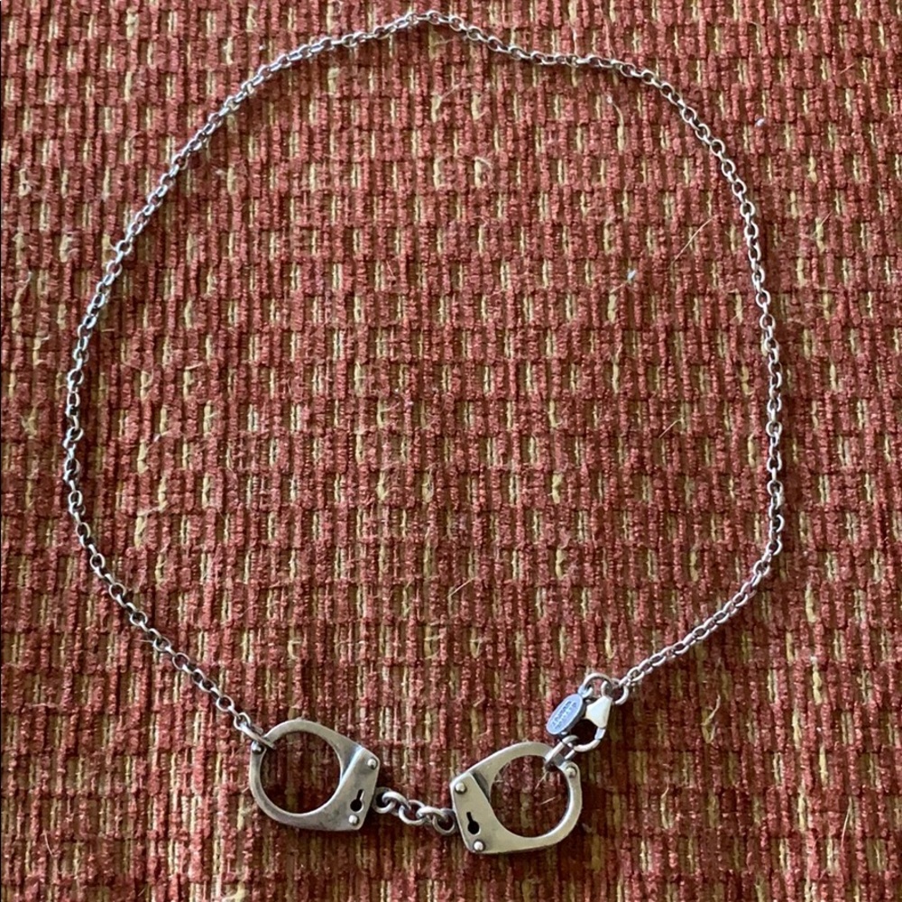 Jessica Elliot sterling silver handcuff necklace.